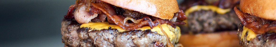 Eating Burger Food Stand Hot Dog at Brackett Burger & Shake restaurant in Brackettville, TX.